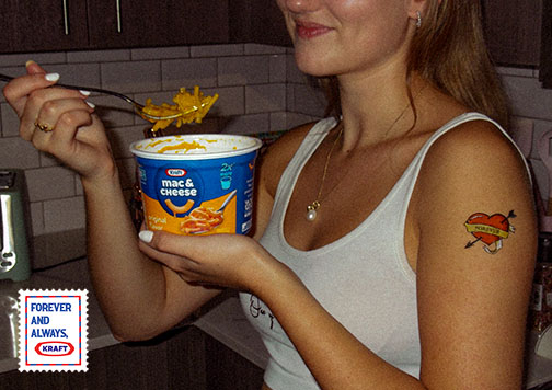 image of arm with temporary heart tattoo on it and kraft mac and cheese